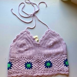 It’s a knitted top, with an open back.